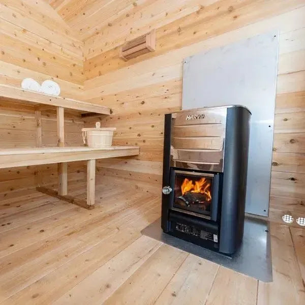 Elevate your relaxation experience with the Georgian Cabin Sauna, expertly handcrafted by Leisurecraft as part of the renowned Timber Collection. Constructed from Eastern White Cedar, this sauna showcases a light wood tone with charming tight knots, perfectly complementing any cottage or home aesthetic.