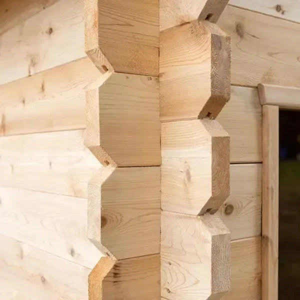 Elevate your relaxation experience with the Georgian Cabin Sauna, expertly handcrafted by Leisurecraft as part of the renowned Timber Collection. Constructed from Eastern White Cedar, this sauna showcases a light wood tone with charming tight knots, perfectly complementing any cottage or home aesthetic.