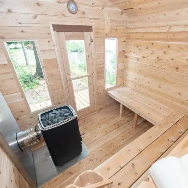 Elevate your relaxation experience with the Georgian Cabin Sauna, expertly handcrafted by Leisurecraft as part of the renowned Timber Collection. Constructed from Eastern White Cedar, this sauna showcases a light wood tone with charming tight knots, perfectly complementing any cottage or home aesthetic.
