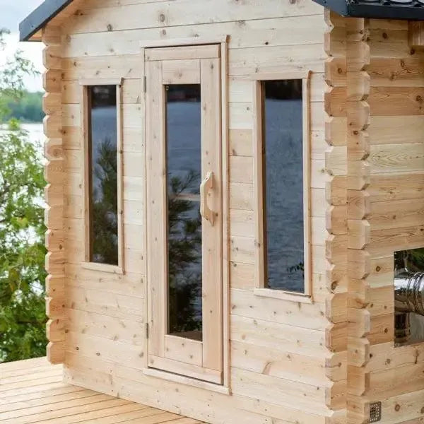 Elevate your relaxation experience with the Georgian Cabin Sauna, expertly handcrafted by Leisurecraft as part of the renowned Timber Collection. Constructed from Eastern White Cedar, this sauna showcases a light wood tone with charming tight knots, perfectly complementing any cottage or home aesthetic. 