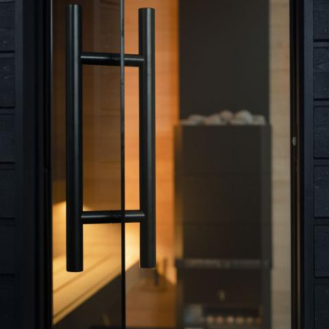 The SaunaLife Model G6 is a fully pre-assembled outdoor home sauna cabin—no kit, no complicated installation. Designed and handcrafted in Northern Europe, this 5-person luxury sauna combines Scandinavian engineering with timeless design to create a turnkey wellness retreat. From its insulated walls to its panoramic glass front, every detail reflects premium craftsmanship and lasting quality.